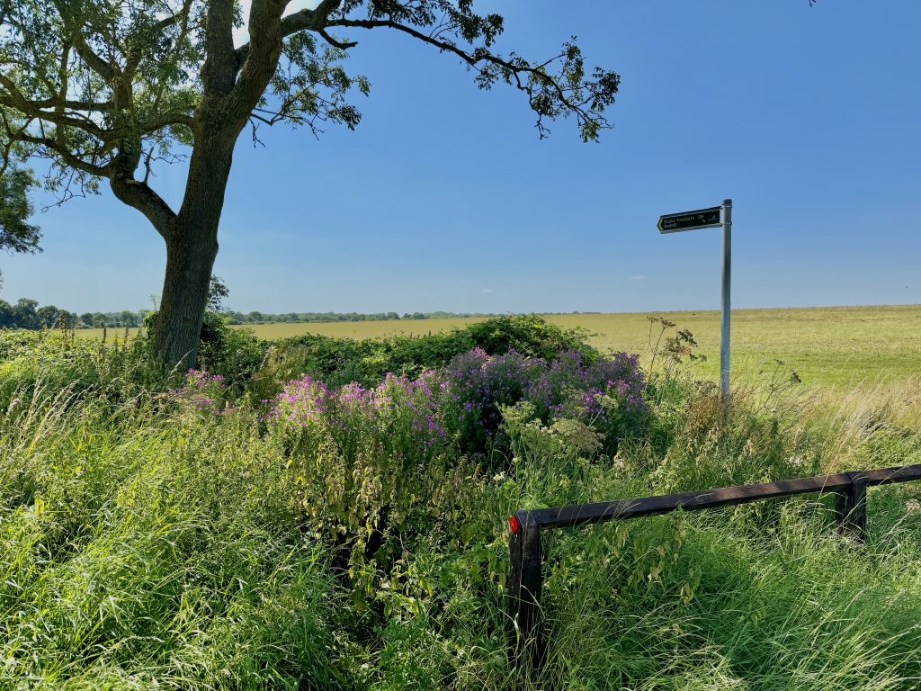 Public footpath sign alongside the first point River Beane is shown on theOS map